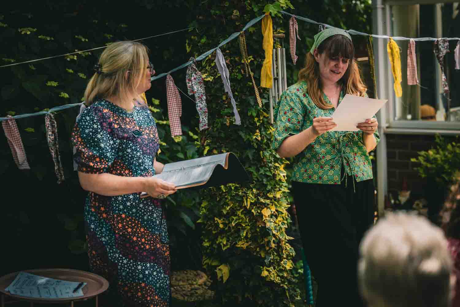 Deb Reed Celebrant Colchester Essex, officiating at Sebestians baby naming while he plays with his dad.